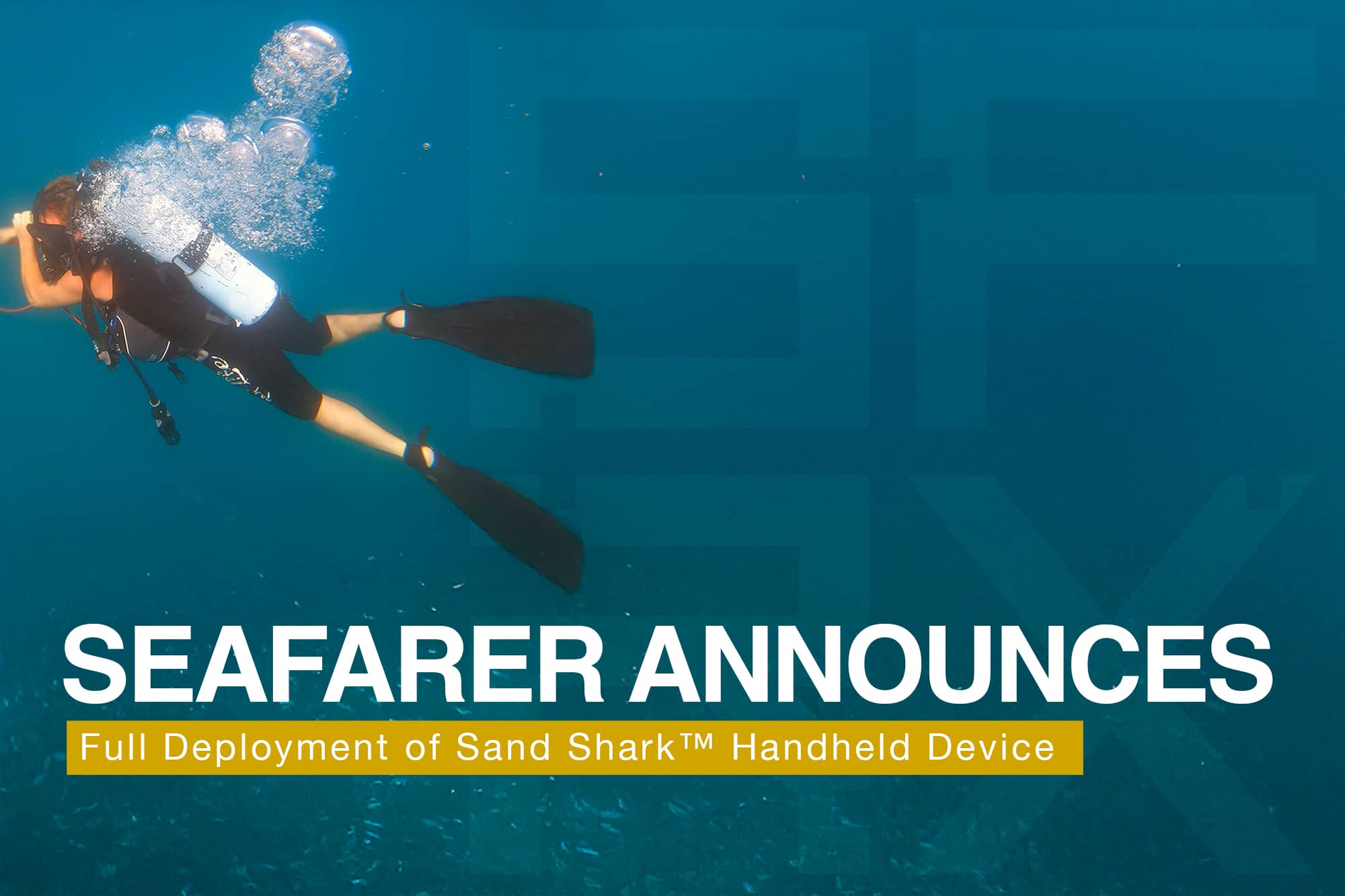 Diver operating Sand Shark™ handheld metal discriminator during field testing in deep ocean conditions.